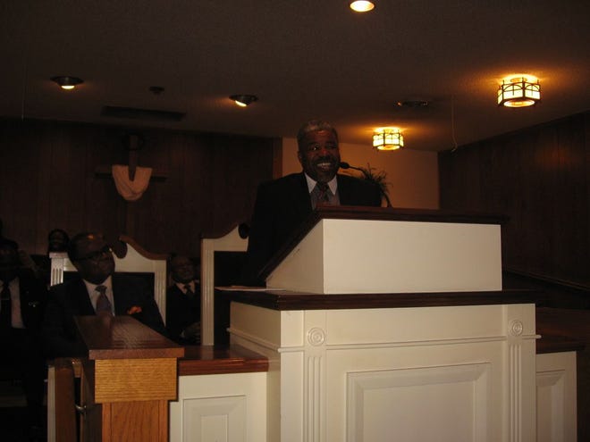 Elder Horace N. Turner, national ruling elder of the Church of God by Faith, delivers the sermon.