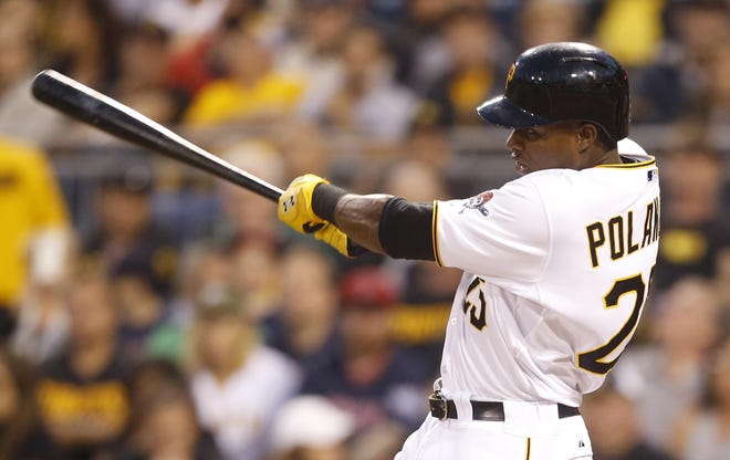Pittsburgh Pirates' Gregory Polanco hits a solo home run in the first inning of a baseball game against the Boston Red Sox, Wednesday, Sept. 17, 2014, in Pittsburgh. (AP Photo/Keith Srakocic)