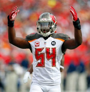 Tampa, Fla. Bay Buccaneers outside linebacker Lavonte David (54) celebrates with the crowd during an NFL game against the St. Louis Rams at Raymond James Stadium in Tampa, Fla. on Sunday, Sept. 14, 2014.