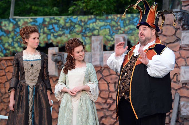 In the Flint Hills Shakespeare Festival's production of "As You Like It," playing nightly through Sunday on the festival grounds north of St. Marys, the court jester Touchstone (Thomas J. Hughes Jr.), right, jokes with Rosalind (Audria Garno), left, and Celia (Kathleen McCarthy).