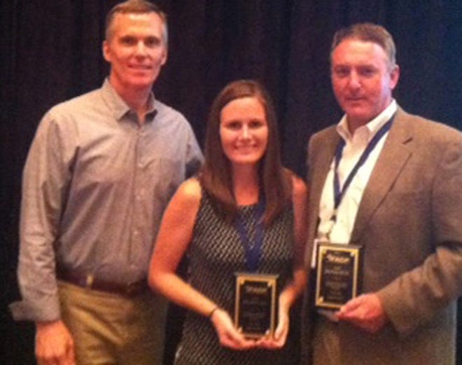 Bob Rohrlack (left), chairman of FACP and president/ CEO of the Greater Tampa Chamber of Commerce, presents Elizabeth Spies, Destin Area Chamber of Commerce VP of Communications, and Shane Moody, Destin Area Chamber of Commerce president/CEO, with plaques in recognition of their 10 and 20 years of chamber service, respectively.