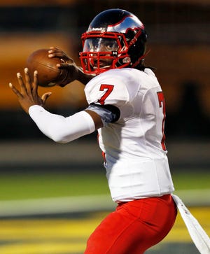 Del City's Terry Wilson (7) passes during a high school football game between Del City and Midwest City at Rose Field in Midwest City, Friday, Sept. 19, 2014. Photo by Nate Billings, The Oklahoman