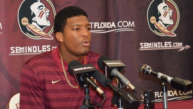 Florida State quarterback Jameis Winston comments on his half-game suspension Wednesday, Sept. 17, 2014, during a news conference at Florida State University in Tallahassee, Fla. (AP Photo/Tallahassee Democrat, Bill Cotterell)
