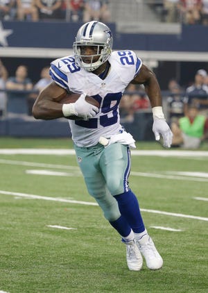 The Dallas Cowboys’ DeMarco Murray leads the NFL in rushing with 285 yards through two games. (Tony Gutierrez/The Associated Press)