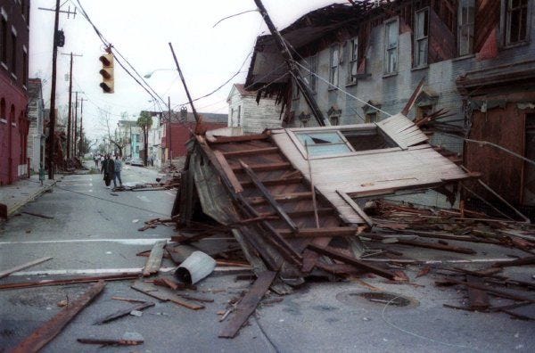 In this Sept. 22, 1989 photo, parts of buildings clutter the streets of Charleston, S.C. after Hurricane Hugo swept through the city.