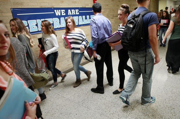 Students make their way through a hallway between classes on Tuesday, September 16, 2014, at Central Valley High School.