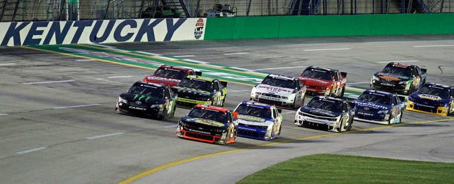 Pole-sitter Ty Dillon (3) leads at the start of the NASCAR Nationwide auto race in Sparta, Ky., Saturday, Sept. 20, 2014. Sam Hornish, Jr. (54) and Brendan Gaughan (62) stay close. (AP Photo/Garry Jones)
