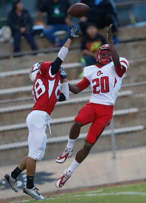Levelland's Michael Lopez breaks up a pass intended for Brownfield's Jezreel Griffin during their game on Friday in Levelland. (Zach Long)