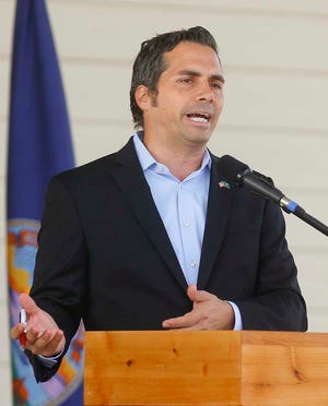 On Monday, U.S. Senate front-runner Greg Orman, shown debating incumbent Sen. Pat Roberts at the Kansas State Fair earlier this month, plans to make public a financial disclosure report amid escalating interest in the independent's bid for office.