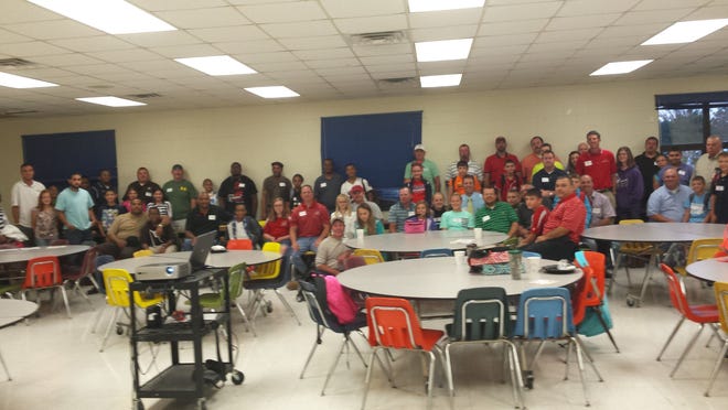 A combination of 68 fathers and kids attended the first "Dad's Day Breakfast" hosted by the Dinwiddie Middle School All Pro Dad Chapter on Sept. 17 in the middle school cafeteria before school.