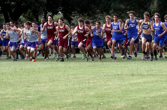 Runners take off Wednesday during the Thibodaux High School-E.D. White High School Invitational Cross Country meet in Thibodaux.