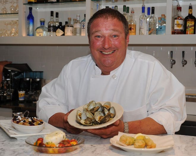 Chef Joe Simone shows some of the dishes at Simone's, his new restaurant in Warren, R.I.