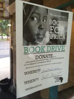Grey Nun Academy's Venth family hung posters and sent notices to publicize their Books For Africa book drive