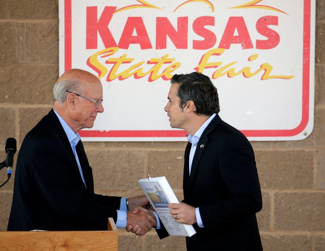 Sen. Pat Roberts, left, R-Dodge City, and Greg Orman, Independent for U.S. Senate, shake hands after their Senatorial Debate at the Kansas State Fair Sept. 6 in Hutchinson, Kansas. File/The Associated Press