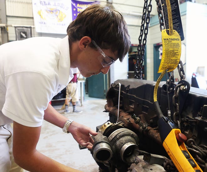 Chris Heller/Staff

Chris LeCompte, 16, works on an engine in a diesel auto mechanics class at Terrebonne Career and Technical High School in Houma.