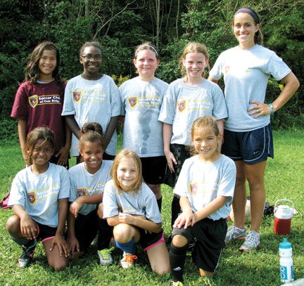 Pictured, from left, top row, in the team photo are Alia DeMint, Jasmine Wilcox, Zoie Cox, Aunika Sharrock and Coach Trenna Howell; second row, Aniya Fisher, Kayla Adcock, Olivia Clark and Gabriela Jacobs.