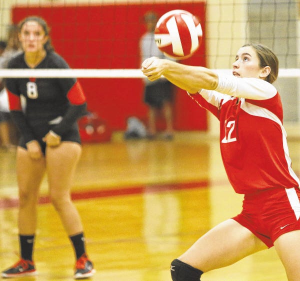 New Bedford's Kalyn Mello bump sets for the Whalers.
