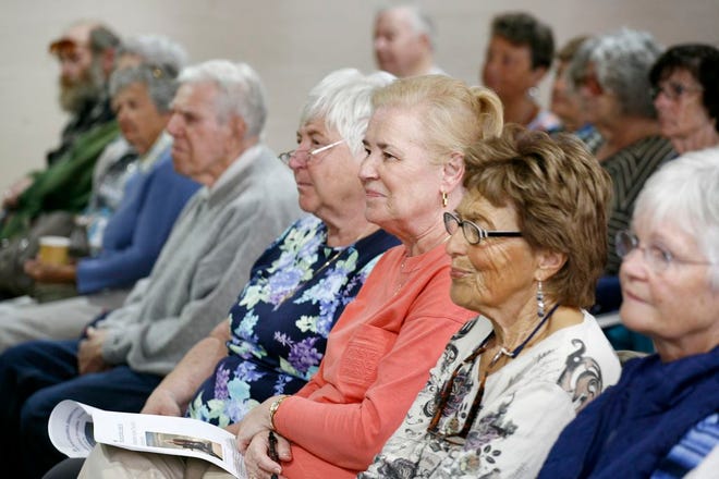 Quincy seniors listen to writer Greg O'Brien during his Alzheimer's talk at the Kennedy Center in Squantum on Thursday Sept. 25, 2014.