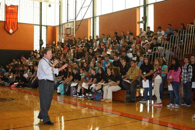 Former Principal Brian Bentley addresses freshmen and sophomores on the first day of the school year at Diman Regional Vocational Technical High School.