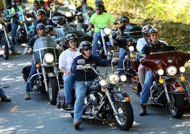 Sharon and Rich McGowan, front center, and other motorcycle riders prepare to leave the Moose Lodge in Marlborough for the third annual Olivia's Ride Saturday. The ride is in memory of the McGowans' daughter Olivia, who died of a rare congenital disorder in 2011 at age 8.  About 150 supporters participated in the 48-mile ride through the region.  Daily News Staff Photo/Ken McGagh