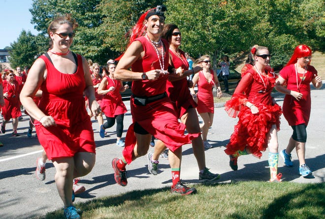 Runners start off during the 4th annual Red Dress Run, Saturday afternoon behind the Tavern in the Square in Northborough.          Daily News Staff Photo/ Marshall Wolff