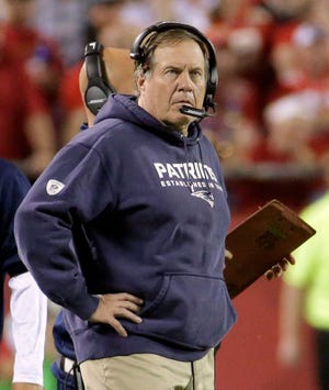 Patriots head coach Bill Belichick looks on during the second half of New England's 41-14 loss to the Chiefs, their worst defeat in 11 years.