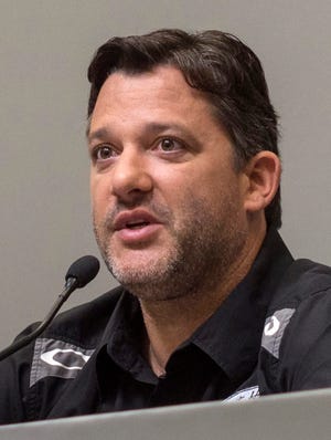 NASCAR driver Tony Stewart speaks with reporters during a news conference at Stewart-Haas Racing Monday, Sept. 29, 2014, in Kannapolis, N.C. (AP Photo/The Charlotte Observer, Mark Hames) MAGS OUT; TV OUT; NEWSPAPER INTERNET ONLY