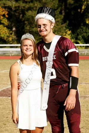 2014 Dundee Homecoming Queen Nolleen Whetham and King Jon Huber were crowned in a ceremony after the Sept. 27 Homecoming football game, won in overtime by the Scotsmen 23-20.