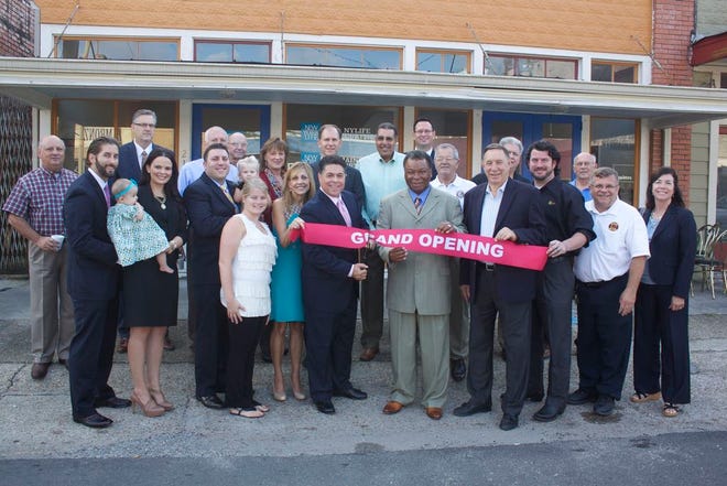 The Donaldsonville Chamber of Commerce cut ribbon for the opening New York Life Insurance on Railroad Avenue last week.