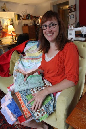 Rachel May, of South Kingstown, who has been quilting for seven years, has written a book on quilting. She teaches at the University of Rhode Island.