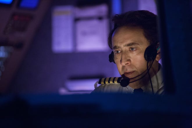 Nicolas Cage stars as an airline pilot who is piloting a transatlantic jet when the biblical Rapture comes in "Left Behind."