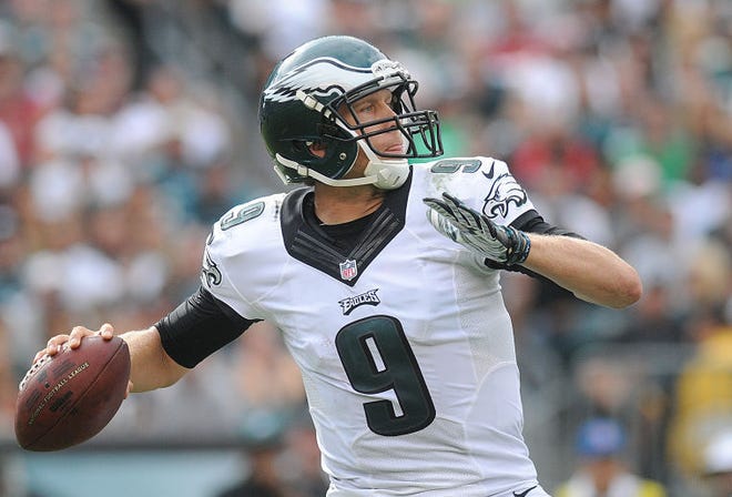 Eagles quarterback Nick Foles (9) makes a pass during their game at Lincoln Financial Field on Sunday, September 21, 2014. The Eagles won 37-34 over Washington.