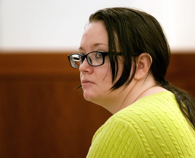 LeeAnne Chesko listens to testimony Wednesday during her murder trial in Worcester Superior Court.