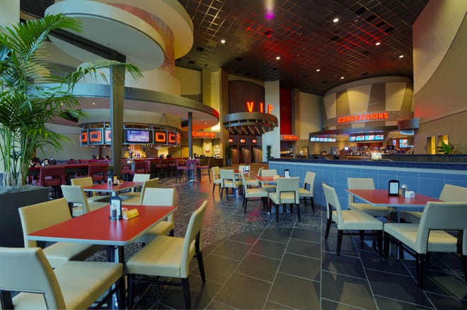 This Cobb Theatres cinema in Leesburg, Virginia, features a sit-down restaurant with full meals — like the chicken and waffles, below — and alcoholic drinks. The company has plans to build a similar theater in Daytona Beach. Industry watchers say operators nationwide are turning to fancy food and adult beverages to draw customers.