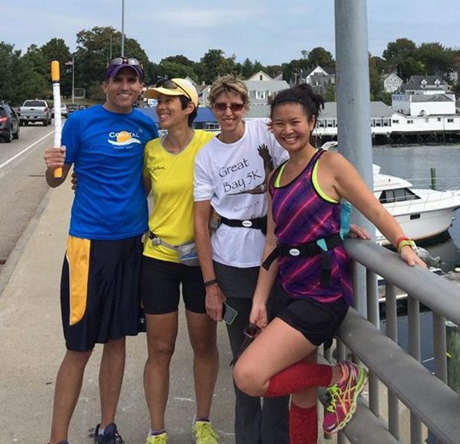 Scott Heffner, left, Michele Liguori of Maynard, Mass., who is also training for Chicago, Pattie Leblanc and Kristy Seid are pictureed recently in Kittery, Maine, after completing a 22-mile run.