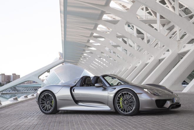 The 2015 918 Spyder, with regenerative brakes and super-light carbon-fiber panels, is the fastest production car ever, says Porsche.