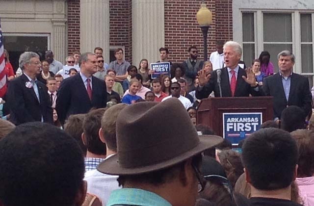 John Lyon • Arkansas News Bureau / Former President Bill Clinton speaks at a rally at the University of Central Arkansas in Conway on Monday, Oct. 6, 2014. Also pictured are 2nd District congressional candidate Pat Hayes, left, U.S. Sen. Mark Pryor, second from left, and gubernatorial candidate Mike Ross, right.