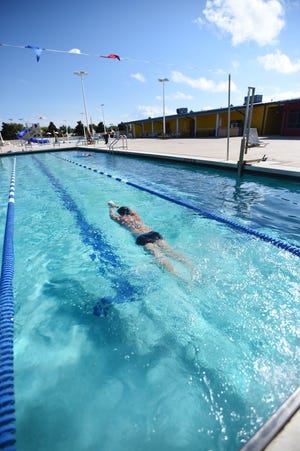 A swimmer uses the pool at the Destin YMCA facility, which will permanently close Friday. Local high school swimming teams held meets at the facility, which was the practice home for Destin Middle School's swim team and the year-round Coast Aquatics. The Fort Walton Beach YMCA, also closing Friday, was home to all local middle school meets and was Choctaw's practice facility.