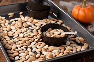 Roasting pumpkin seeds is a Halloween tradition your kids will always remember.