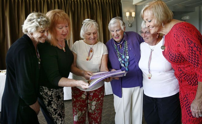 Members of the “Dirty Dozen” women’s tennis group reminisce on Wednesday, Sept. 17, 2014, during their season’s-end celebration at South Shore Country Club. From left are Jeanne Murphy, Joan Kenney, Candy Heath, Mary Bigler, Linda Long and Shyla Settles.