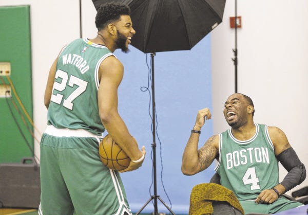 Boston Celtics forward Christian Watford, left, shares a laugh with guard Marcus Thornton, right, during NBA team media day, Monday, Sept. 29, 2014, in Waltham, Mass.