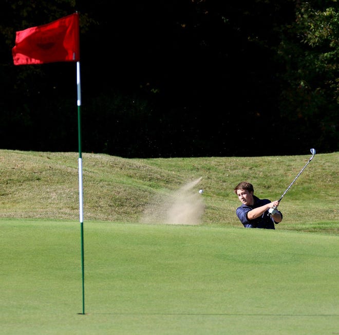 Portsmouth High School's Sam Vitale hits from a bunker on the second hole during the Division II golf state tournament at Pease Golf Course in Portsmouth on Thursday. The Clippers placed fourth overall.

Photo by Rich Beauchesne/Seacoastonline