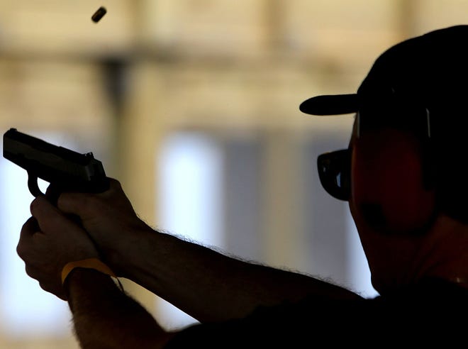 Louis Waycuilis uses the pistol range at the newly opened Bay County Shooting Range on Friday near West Bay.
