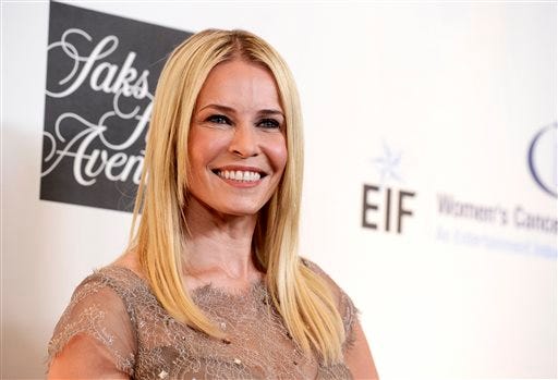 FILE - In this May 2, 2013 file photo, Chelsea Handler arrives at "An Unforgettable Evening" benefiting EIF's Women's Cancer Research Fund at The Beverly Wilshire in Beverly Hills, Calif. The 39-year-old comic says she knew when it was time to say goodbye to her E! Talk show, "Chelsea Lately”. She announced in June that she had struck a deal with Netflix as her next career move. It begins with a standup performance debuting on the site Friday, based on her best-selling book and comedy tour, "Uganda Be Kidding Me." (Photo by Dan Steinberg/Invision/AP, File)