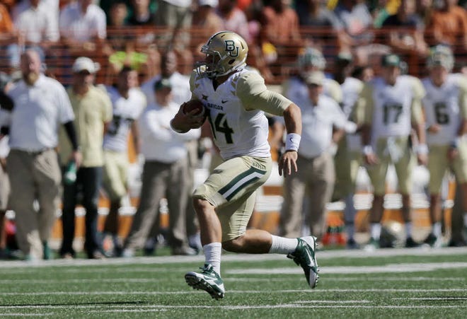 Baylor's Bryce Petty runs against Baylor during the first half an NCAA college football game, Saturday, Oct. 4, 2014, in Austin, Texas. (AP Photo/Eric Gay)