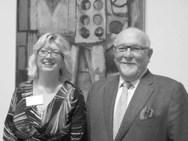 Newport Art Museum Curator Nancy Whipple Grinnell is pictured with Joseph A. Chazan, producer of the NetWorks art exhibit, now on display at the museum.