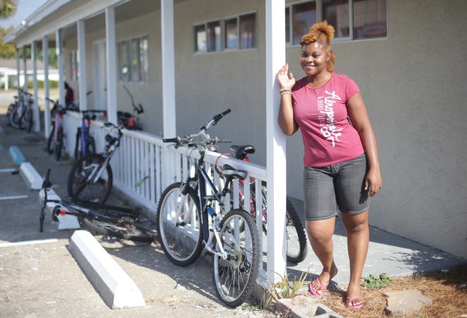 Natalia Webber, from Kingston, Jamaica, stands in front of her temporary living quarters in Panama City Beach in August. She was here on a J1 Summer Work Travel Program to bring home money to pay for law school.