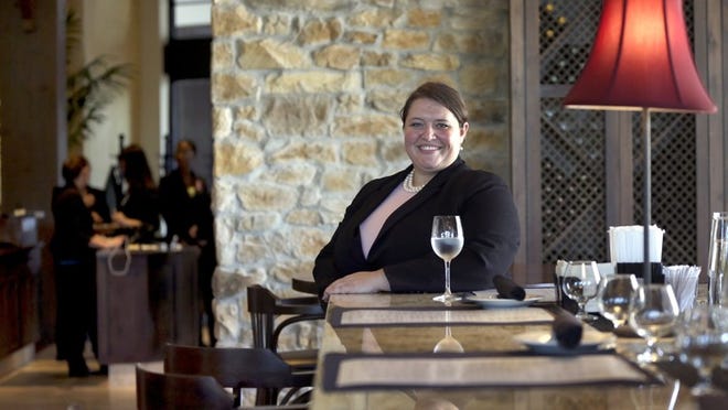 Jennifer Dochterman, general manager of Bravo Cucina Italiana Restaurant Oct. 09, 2014 in Jupiter. The 60-table restaurant with 120 full- and part-time employees will open at Harbourside on Saturday. (Bill Ingram/Palm Beach Post)