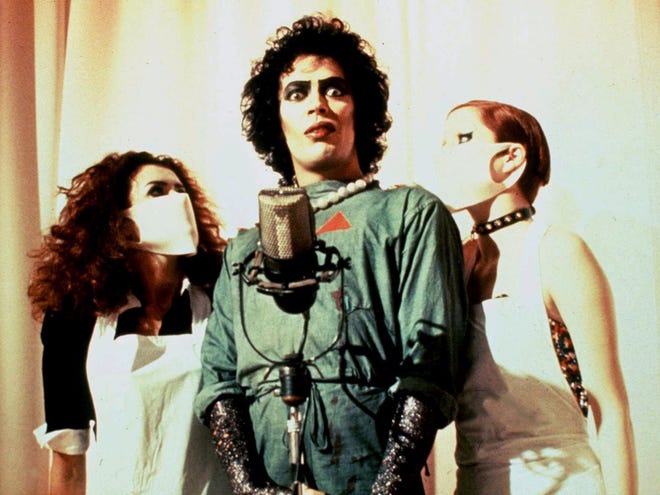 The cast of 1975's “Rocky Horror Picture Show” includes, from left, Patricia Quinn as Magenta, Tim Curry as Dr. Frank N. Furter and Nell Campbell as Columbia.