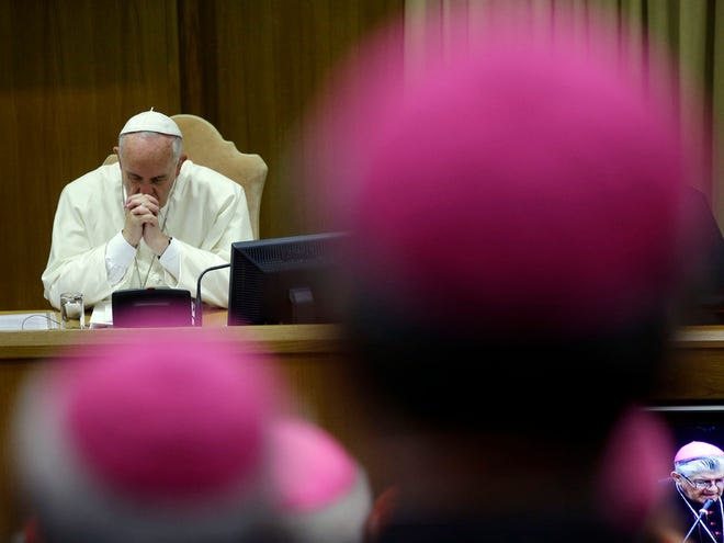Pope Francis attends a morning session of a two-week synod on family issues at the Vatican on Monday.